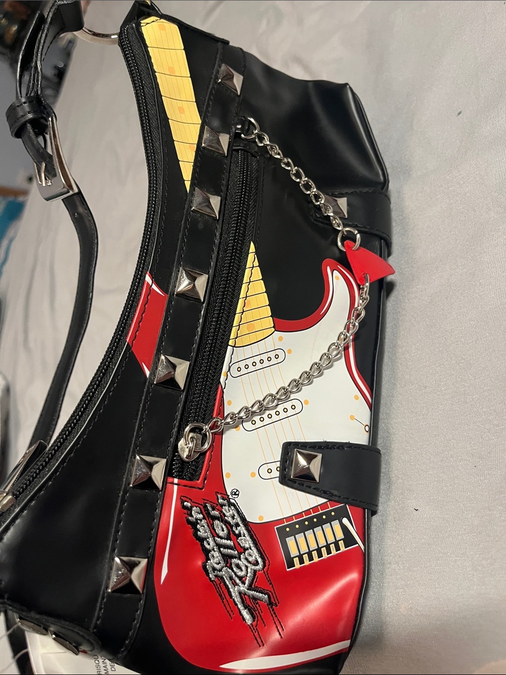 Disney Black Shoulder Bag with Red Guitar Graphic and Silver Studs